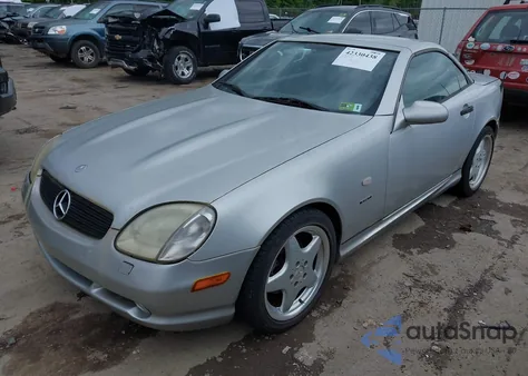 1999 Mercedes-Benz Slk 230 Kompressor z USA, uszkodzony, nr VIN WDBKK47F0XF100495